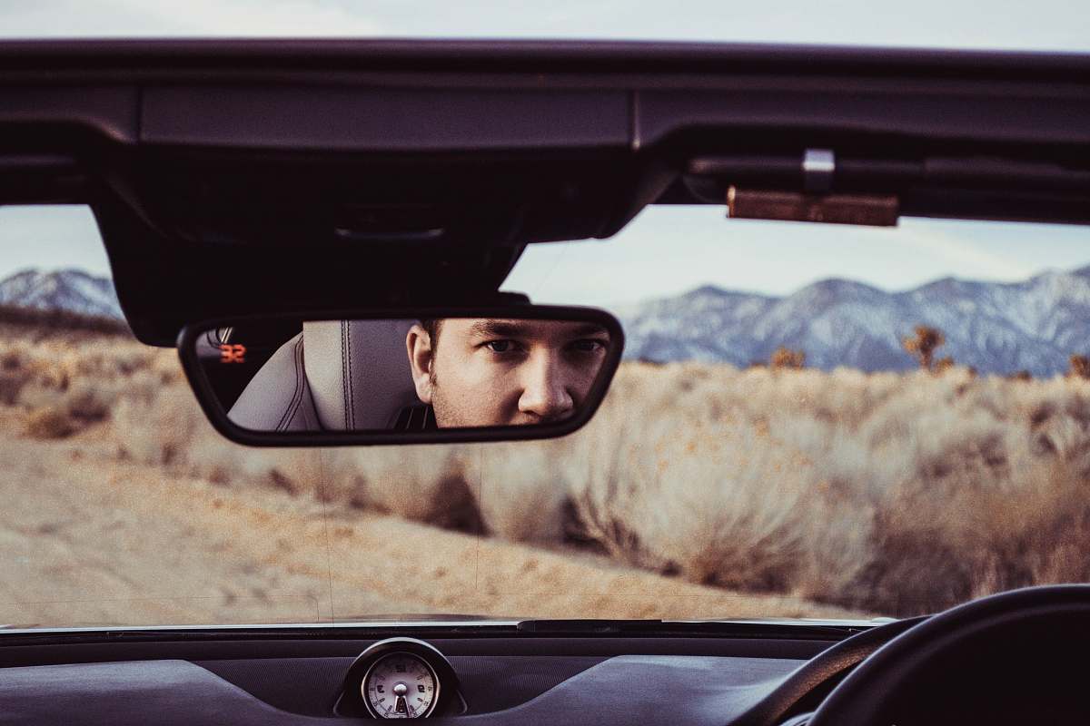 car mirror person staring at rear view mirror pearblossom